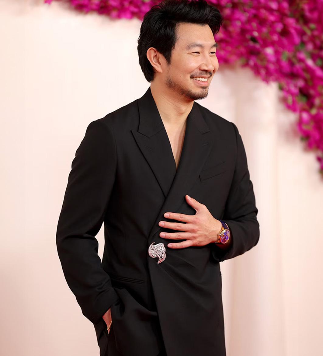 Simu Liu in Jacob & Co.\'s \"The World Is Yours\" Dual Time Zone timepiece